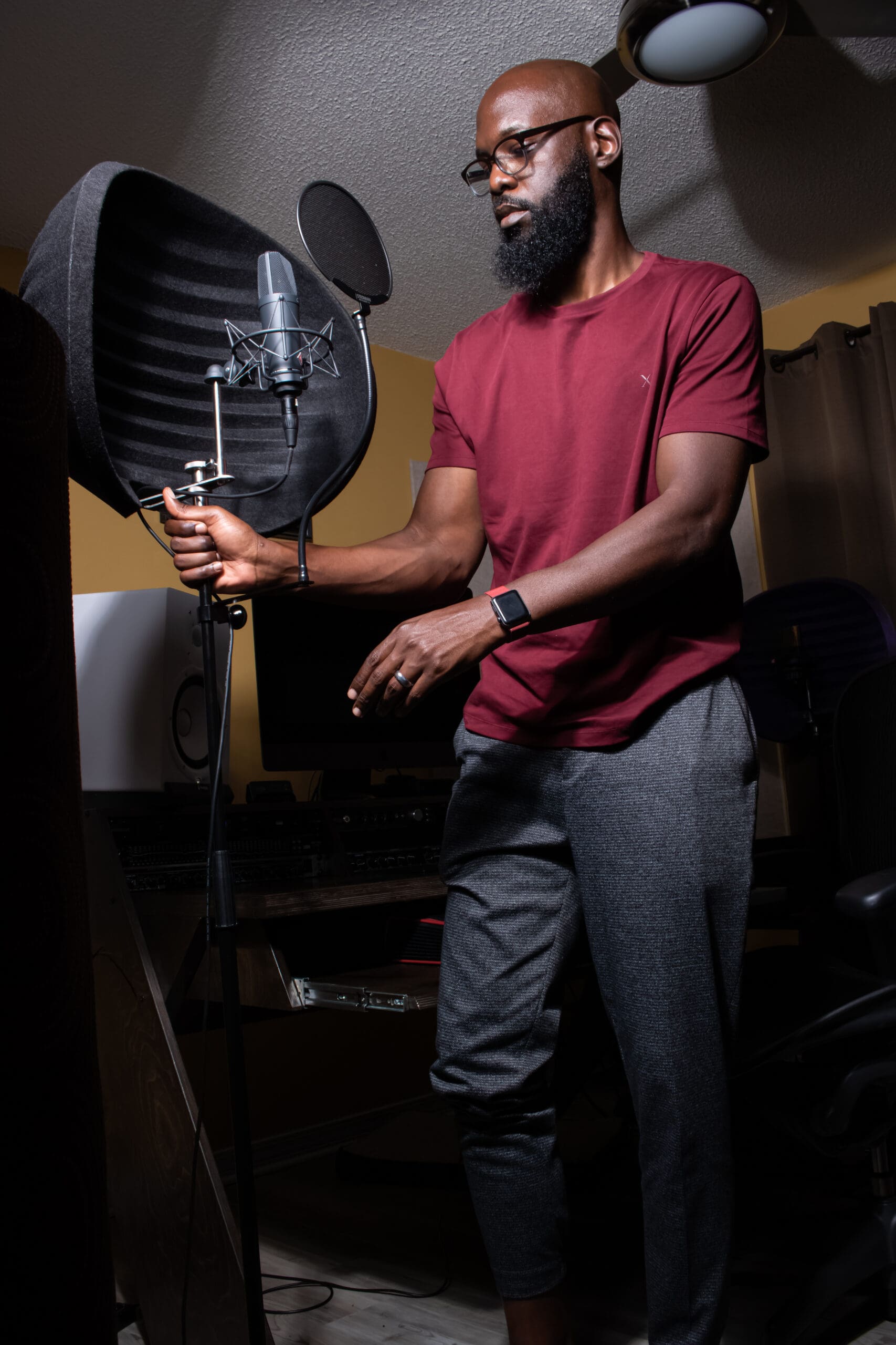 Samuel Hill with a Neumann TLM 197 microphone at Vivid Tempo Studio
